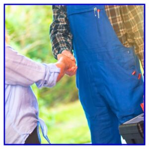 A plumber shaking hands with client after a service.
